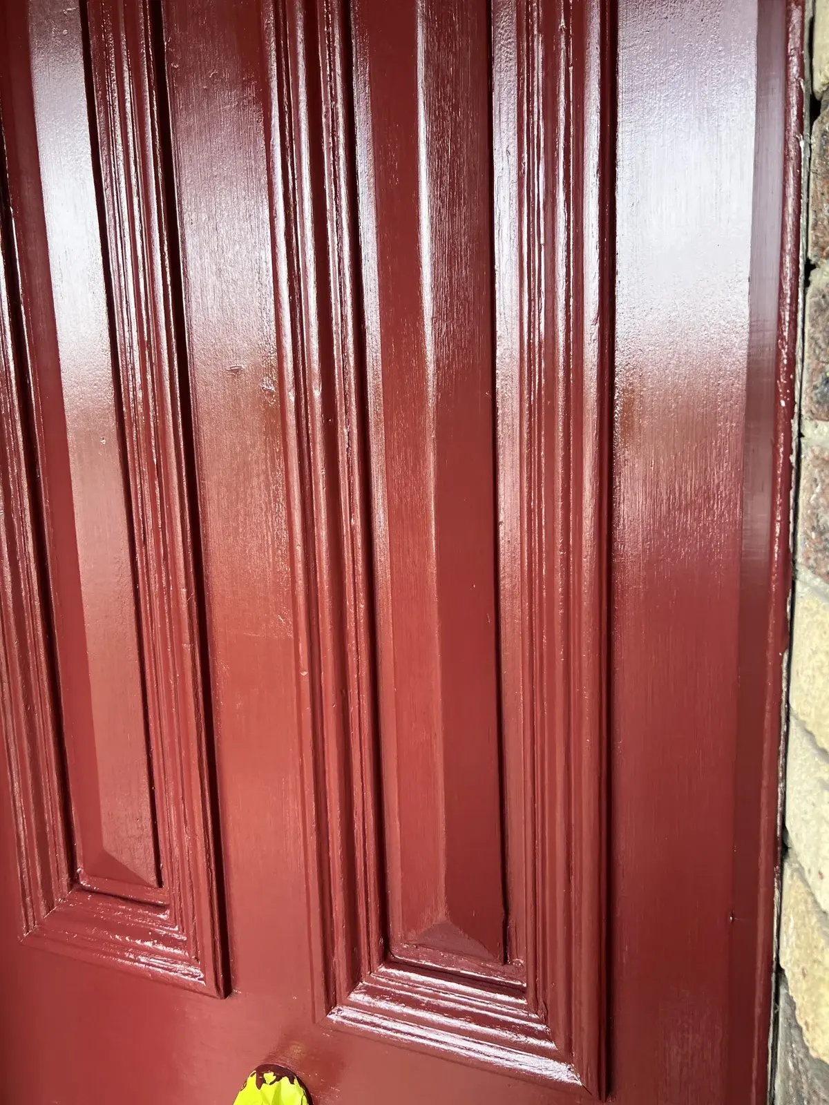 Red panelled entrance door finish